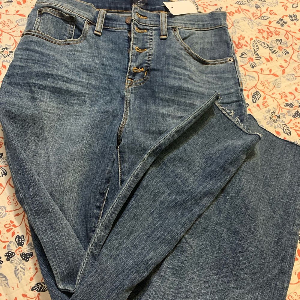JCrew high waisted jeans with fray bottoms.